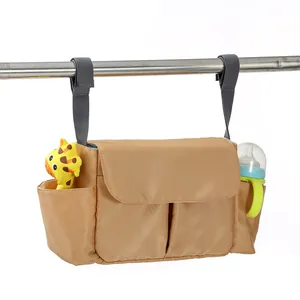 Foldable baby stroller organizer in khaki with bottle pockets and adjustable straps