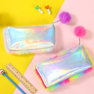Detail of rainbow plush pencil case with laser fabric and soft faux fur pompom charm