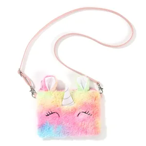 Rainbow plush unicorn crossbody bag with glitter horn and pink faux leather strap