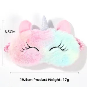 Detail view of unicorn plush eye mask with 19.5cm width and silver horn decoration