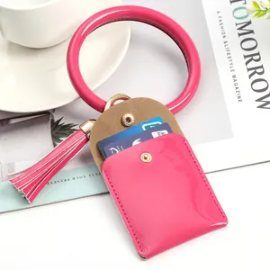 Hot pink patent leather wristlet keychain with card holder and stylish tassel