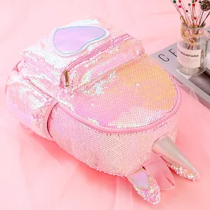 Detailed view of pink sequin unicorn backpack with holographic heart and unicorn horn