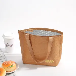 Close-up of insulated Tyvek lunch bag with silver foil lining and smooth metal zipper
