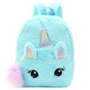 Detail of light blue unicorn plush backpack with rainbow horn and soft faux fur texture