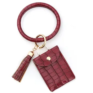 Porte-clés bracelet en cuir crocodile bordeaux avec porte-cartes et gland élégant