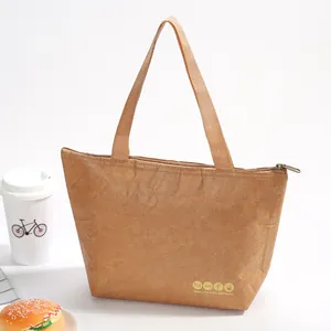 Close-up of Tyvek insulated lunch bag with woven handle and metal zipper detail