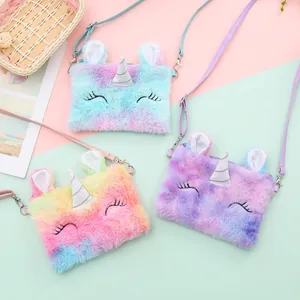 Detailed view of plush unicorn crossbody bags in vibrant gradient pastel colors