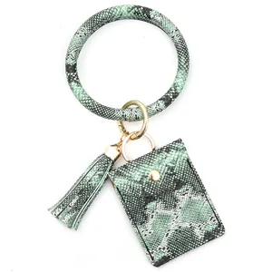 Green snakeskin PU leather keychain set with oversized bangle bracelet and tassel wallet