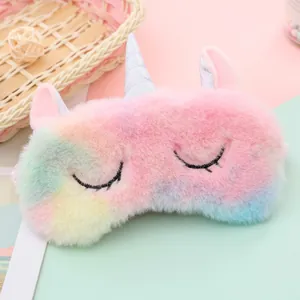 Detail of colorful plush unicorn eye mask with soft fur and silver sequin horn