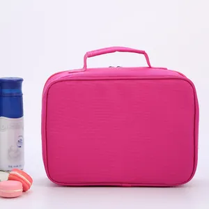 Close-up of rose red insulated lunch bag featuring durable handles and dual zipper closure
