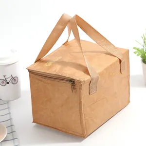 Macro detail of kraft paper lunch bag with thermal aluminum foil and food icon