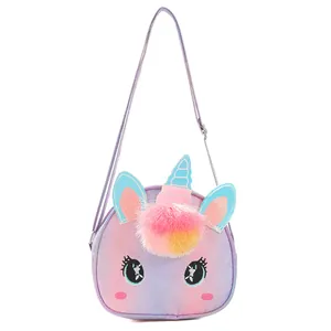 Detail of cute purple unicorn crossbody bag for kids with glitter texture and pom-pom