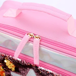 Close-up of pink lunch bag with glitter sequins and holographic material detail