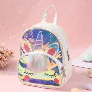 Detail of glitter ears and unicorn horn on a holographic TPU backpack for girls