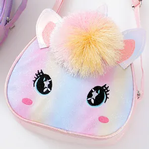 Pink glitter unicorn crossbody bag for girls with embroidery and a large colorful pompom