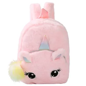 Pink plush unicorn backpack for girls with rainbow horn and fluffy pompom ornament
