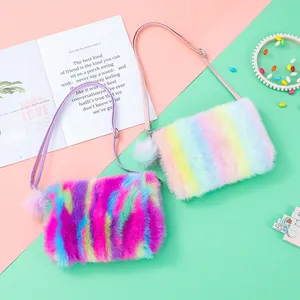 Cute rainbow plush crossbody bag for little girls featuring soft fur and pompom charm