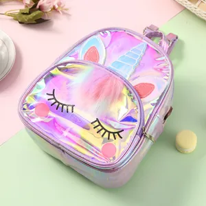 Close-up of holographic unicorn backpack with shiny laser TPU finish and soft pink pompom