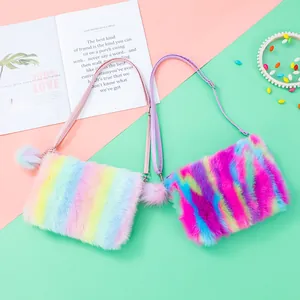 Kids plush rainbow crossbody bag with soft faux fur and fluffy pompom keychain detail