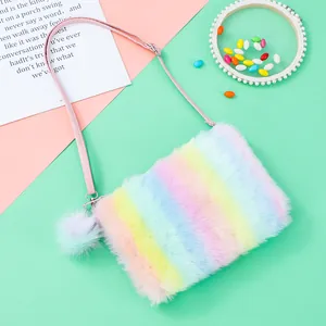 Cute rainbow faux fur crossbody bag for girls with soft plush texture and pompom detail