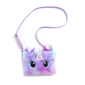 Detail of plush unicorn crossbody bag featuring gradient fur and 3D horn decoration