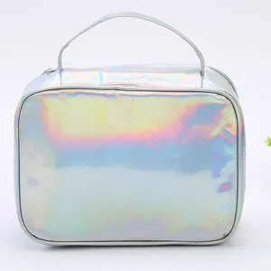 Close-up of holographic silver lunch bag showing shiny metallic texture and zipper detail