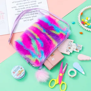 Plush rainbow crossbody bag for girls with purple strap and pink pompom accessory