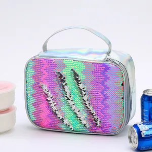 Detailed view of a holographic sequin lunch bag with claw marks and a silver zipper