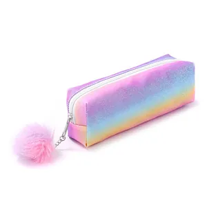Rainbow glitter pencil case with a soft pink plush pompom charm and zipper closure