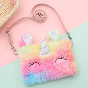 Macro detail of plush unicorn bag showing sequin horn and soft rainbow fur texture