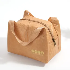 Detail view of Tyvek lunch bag with insulated lining and zipper closure on white background