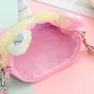 Detailed view of plush unicorn bag with macaron colored fur trim and pink lining