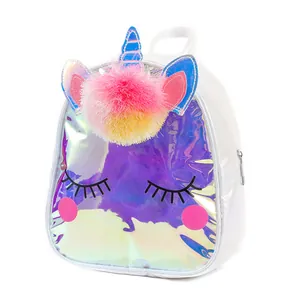 Close-up of holographic unicorn backpack featuring plush pompom and sequin ear details