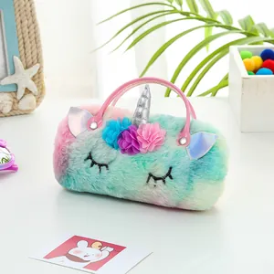 Detail view of plush unicorn handbag with rainbow faux fur and decorative flowers