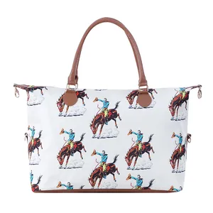 Sac de voyage en toile à motif vintage cowboy avec poignées en cuir marron