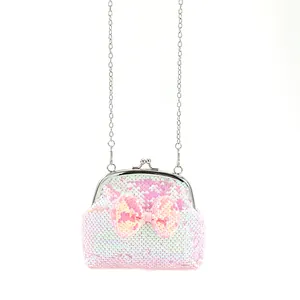Pink sequin crossbody bag with a bow and silver metal chain strap for kids and girls