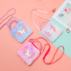 Colorful plush unicorn crossbody bags for kids in pink, purple and rose gradient colors