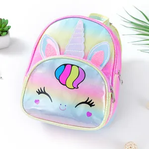 Close-up of holographic unicorn backpack with rainbow horn and 3D ears detail