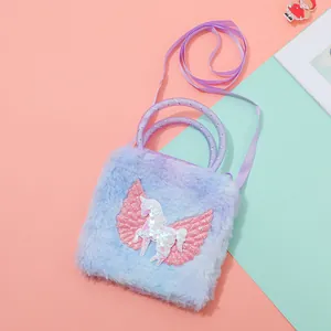 Close-up of lavender plush unicorn bag with shimmering sequin details and soft wings