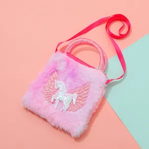 Detail of pink plush unicorn crossbody bag with sequin embroidery and woven strap