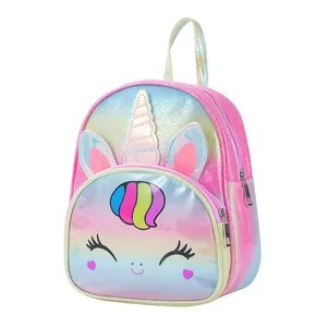 Detailed view of the shiny unicorn horn and rainbow mane on the gradient girl's backpack