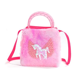 Detail of plush rainbow unicorn bag featuring sequins and shiny pink wings for kids