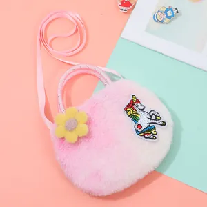 Detail of plush unicorn bag showing fluffy texture, sequin patch, and pink strap
