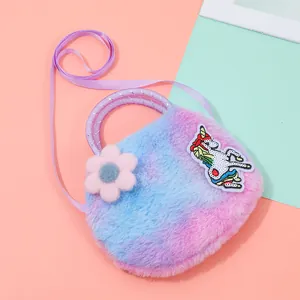 Macro shot of fluffy rainbow unicorn bag with sequins and soft purple glitter handles