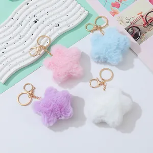 Sternförmige Plüsch-Schlüsselanhänger in Pink, Blau, Lila und Weiß mit goldenen Clips