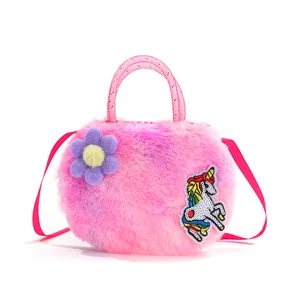 Detail view of colorful plush unicorn bag showing sunflower decor and sequin patch