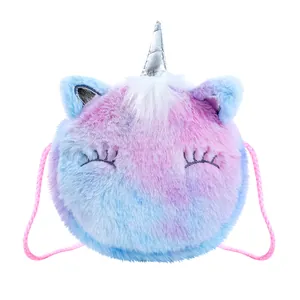 Detailed close-up of plush unicorn crossbody bag with rainbow faux fur and silver horn