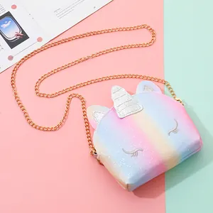 Sparkly unicorn crossbody bag with rainbow glitter finish and golden chain strap for girls