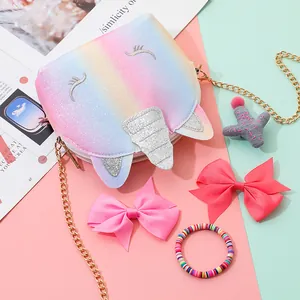 Glittery rainbow unicorn crossbody bag for girls with sparkling horn and golden chain strap