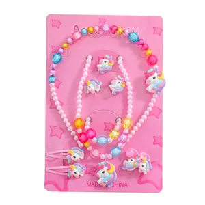 Set gioielli unicorno per bambine con collana bracciale e fermagli rosa su scheda